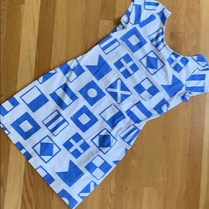 White and blue short sleeve Mahi Gold Addie dress.